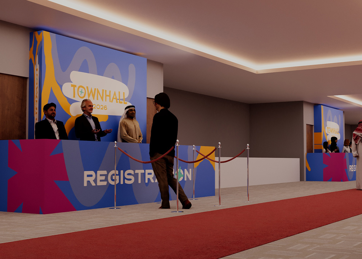 Welcome area and guest reception at the QDB Town Hall event